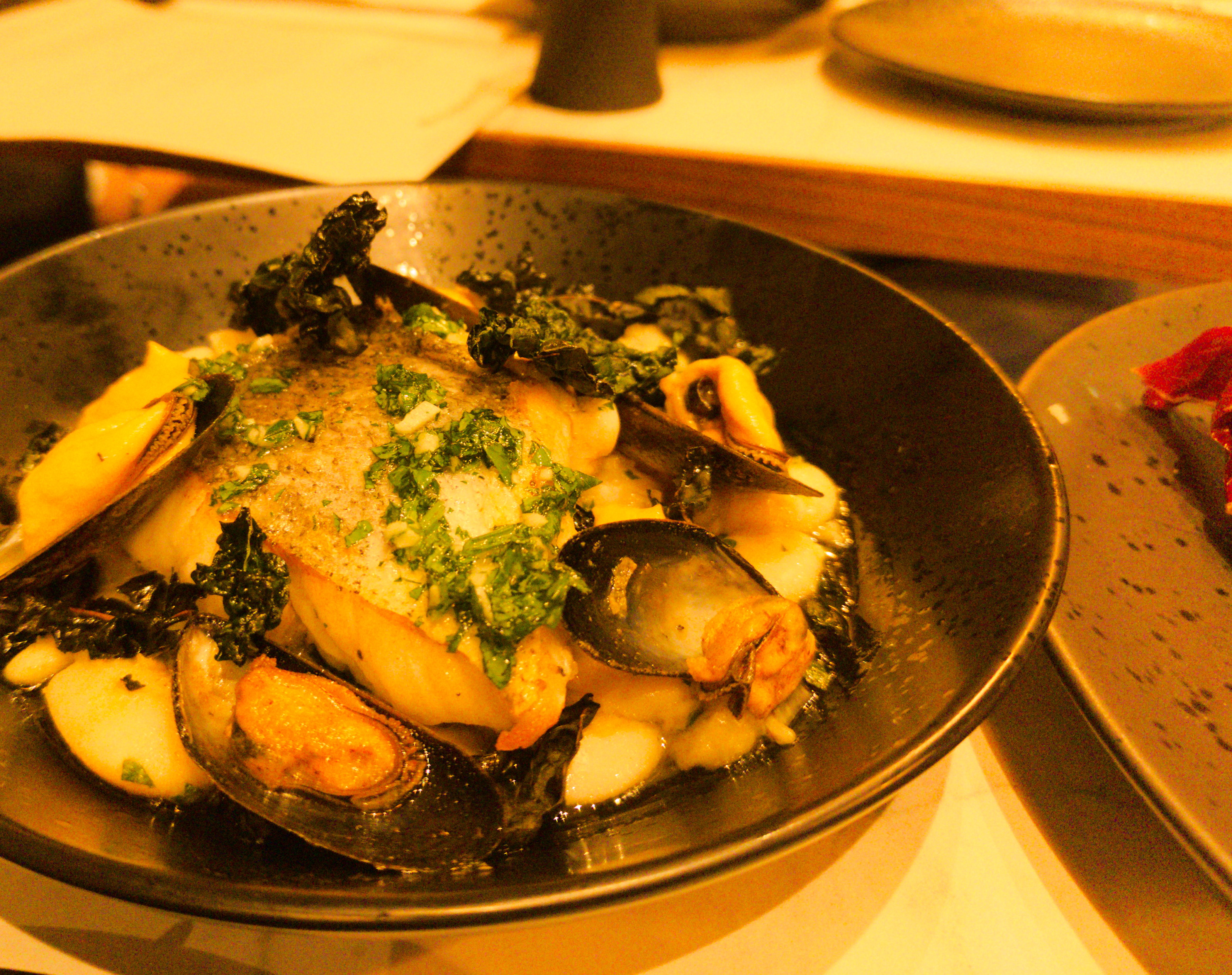 A beautifully plated dish on a restaurant table.
